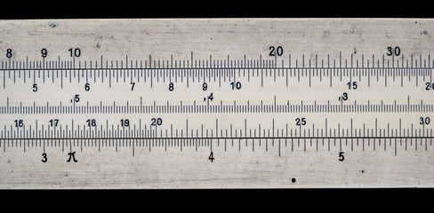 Old pocket slide rule mechanical calculator
