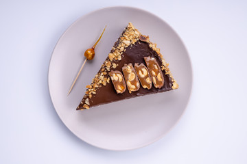 chocolate cake on a plate on a light background2