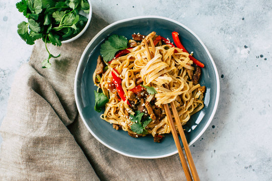 Asian food, udon noodles with vegetables, healthy vegetarian menu