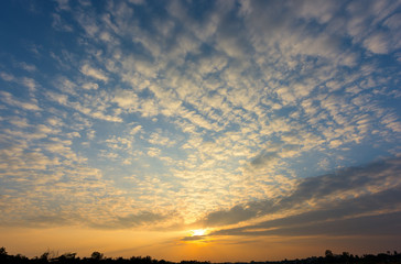 Beautiful sunset sky with clouds