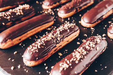 Traditional french eclairs with chocolate. Tasty dessert. Home made cake eclairs  Sweet. Dessert....