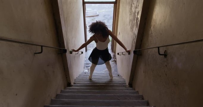Female dancer in an empty warehouse