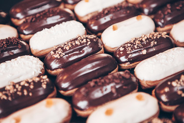  Traditional french eclairs with chocolate. Tasty dessert. Home made cake eclairs  Sweet. Dessert....