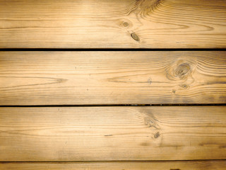 Closeup of old panels or planks, vintage wood texture with knots. Background concept