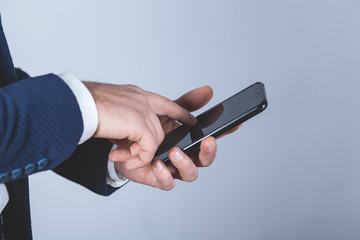 man hand holding smart phone