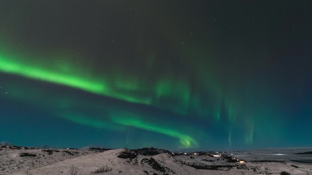 High resolution cinematic time lapse of the northern lights also called as Aurora Borealis over the Iceland in the winter time