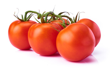 Fresh raw tomatoes isolated on white background