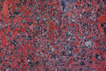 Old stone background from red granite, for advertising construction services