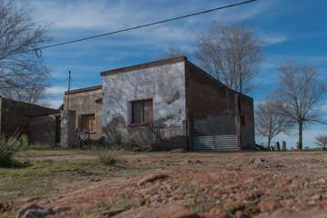 Fototapeta na wymiar Ruins of a house in an abandoned town