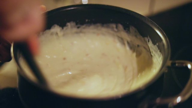 Mixing nacho cheese sauce slow motion