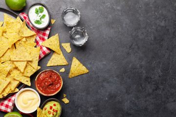 Mexican nachos chips and tequila