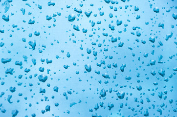 raindrops on the window glass on a rainy day