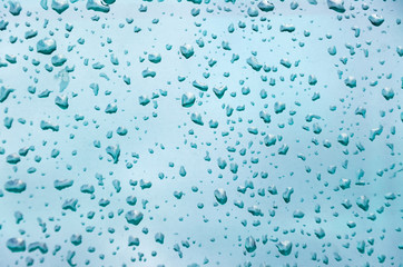 raindrops on the window glass on a rainy day