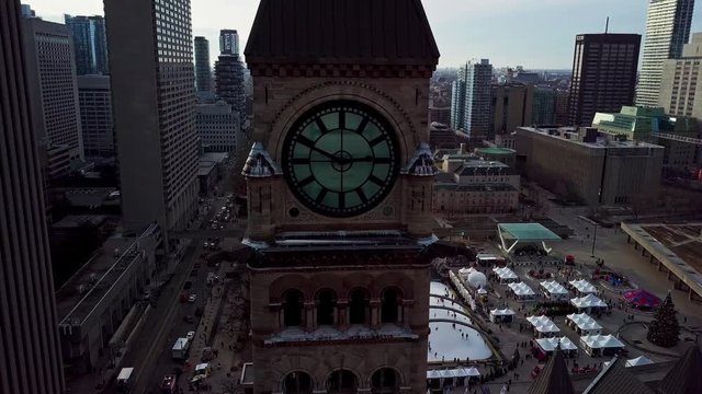 Majestic Old Clock Tower at Nathan Phillips Square in Toronto Canada.