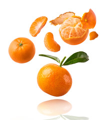 Fresh ripe mandarine on white background.