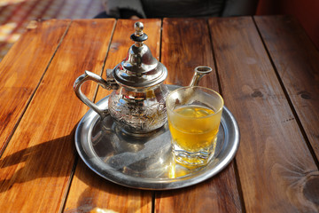 Silver tea set with hot mint tea