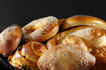 Freshly baked homemade pastries with sweet cream filling close-up.