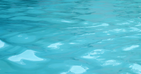 Fototapeta na wymiar Swimming pool water wave in blue color