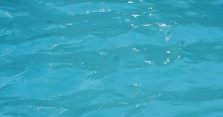 Blue water wave in swimming pool