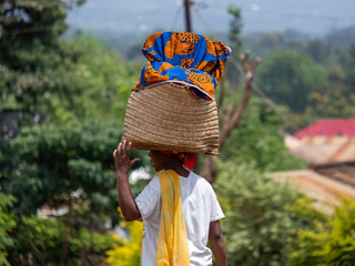 Moshi, Tanzania 8.1.2020 - Traditional life in Moshi, Tanzania women carrying cloths on her head 
