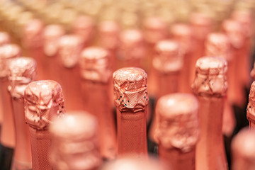 pattern of the same white or gold champagne bottles, celebration of the holiday