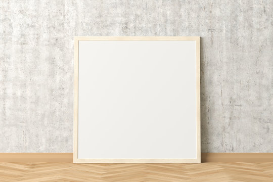 Blank square poster frame mock up standing on light herringbone parquet floor next to concrete wall. Clipping path around poster. 3d illustration