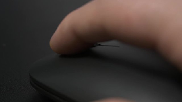 Extrem Close Up Man Hand Click and Scroll in Computer Wireless Mouse