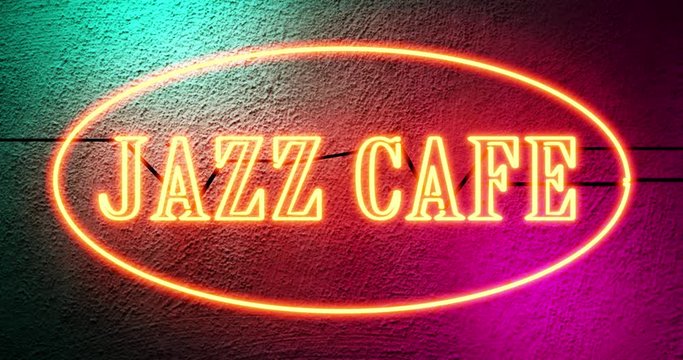 Jazz Cafe sign shows entrance to musical bar entertainment. Neon signage for live band and pub - 4k