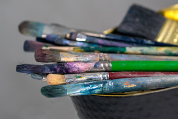 Colorful paint brushes Art concept. Painting process