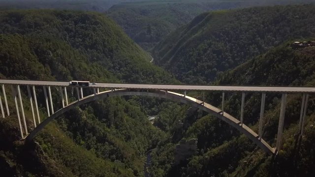 Flying Over Epic Bloukrans Bungee Bridge & River, South Africa, Aerial Drone Forward Tilt Down Motion