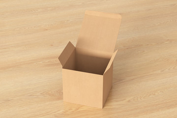 Blank cardboard cube gift box with opened hinged flap lid on wooden background. Clipping path around box mock up. 3d illustration