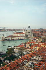 Fototapeta na wymiar View from Campanile di San Marco to Grand Canal and Basilica di Santa Maria della Salute at summer sunny day in Venice, Italy