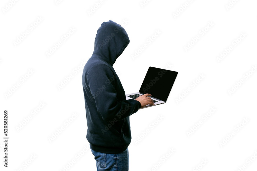 Wall mural hacker in the hood with laptop isolated on white background