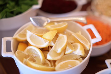 sliced lemons in a bowl