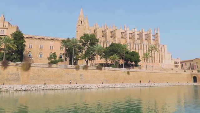 A long panning view of Palma Cathedral Roman Catholic Diocese of Majorca exploring its uniqueness, Mallorca, Spain.