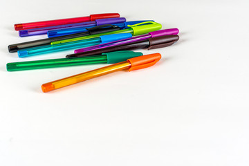 Set of colored pens isolted white background.