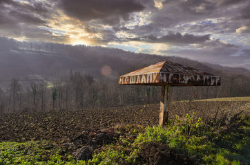 Abandoned Bus Stop In Mountains