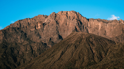 Mount Meru and its ash cone above clouds. Arusha  Tanzania. Africa. 