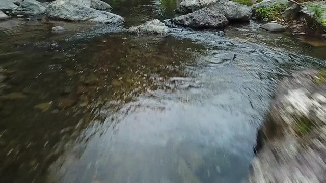 Freshwater Mountain Creek Water Under Las Garzas Waterfall, Puerto Rico, Slowmotion Aerial View