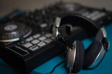 Obraz na płótnie Canvas Headphone and sound audio controller music mixer dj pult