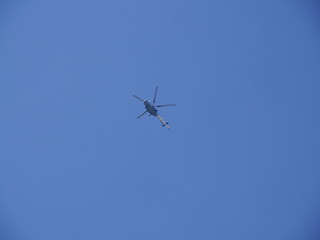 Helicopter in the blue sky 