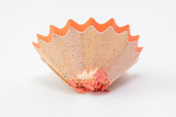 Obraz na płótnie Canvas Wooden colored pencil-sharpening shavings pile on white background