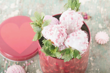 Yogurt glazed strawberries and heart shaped meringues