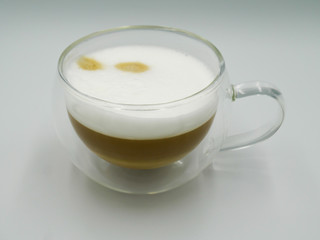 Obraz na płótnie Canvas Isolated double glass cappuccino beverage