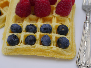 Sweet waffles with blueberries and raspberries