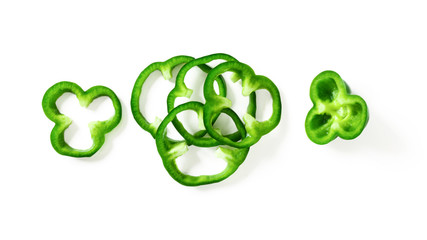 Gree sliced bell pepper isolated on white background top view.