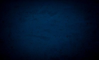 Blue background. Cement floor in a dark room with a spotlight. For installation.