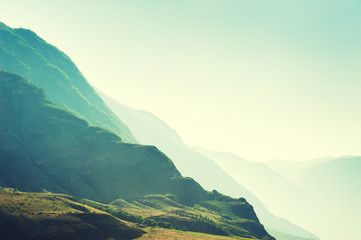 Green mountains at sunset. Vintage filter. Beautiful summer landscape. Altai, Siberia, Russia