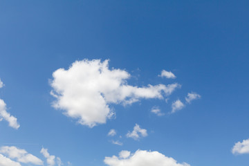 White fluffy cloud and blue sky background
