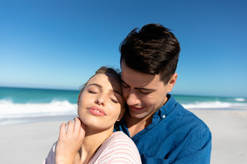 Young couple in love at the beach